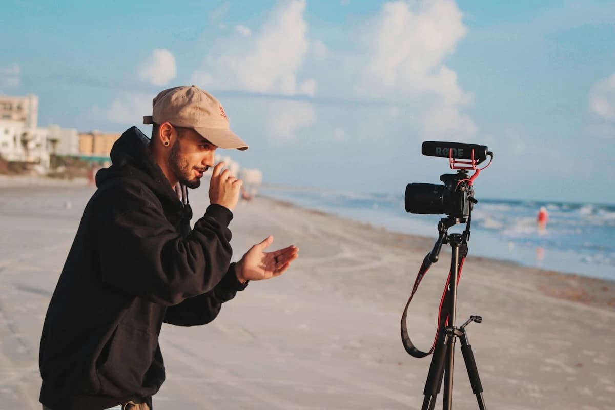Creator filming lip sync video content for social media with smartphone